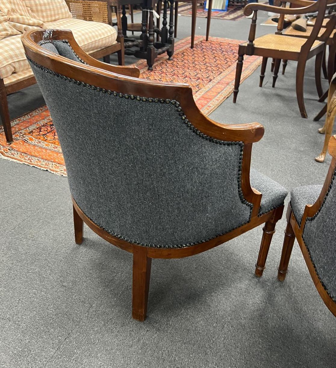 A pair of French Empire style gilt metal mounted upholstered mahogany tub framed chairs, width 62cm, depth 60cm, height 71cm